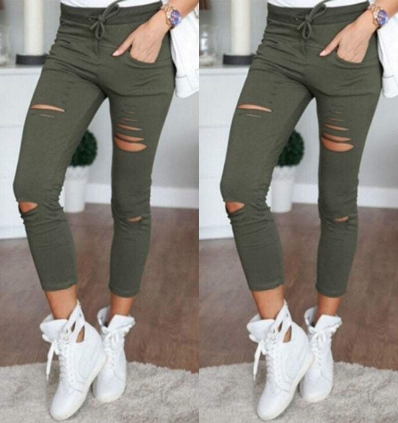 Fall Women's mid-length ripped pants.
