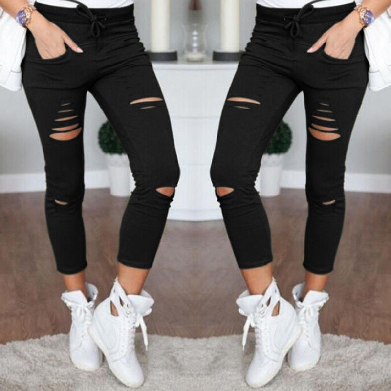 Fall Women's mid-length ripped pants.