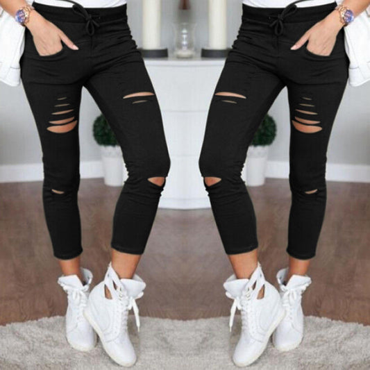 Fall Women's mid-length ripped pants.